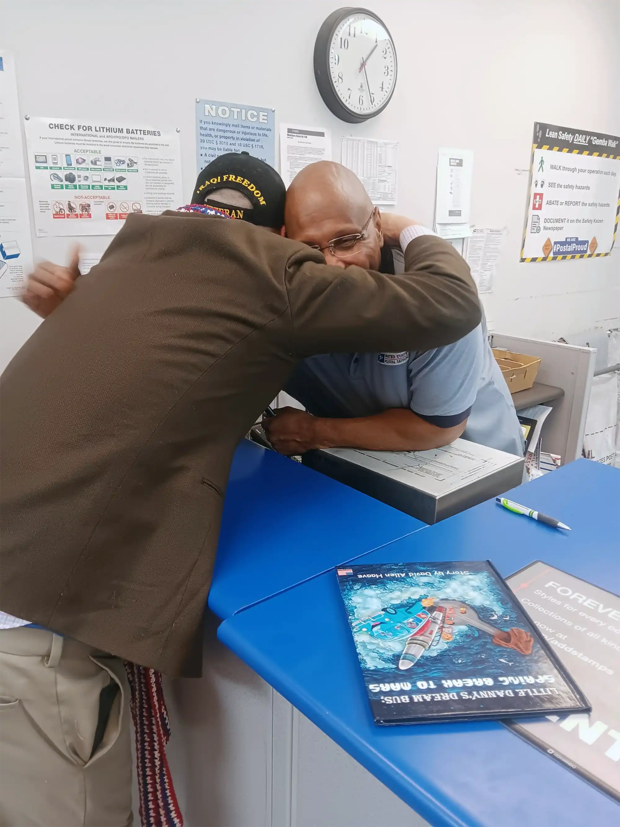Smiles and hugs at the US Post office, author David Haave sending out the Spring Break to Mars book, MO, USA.